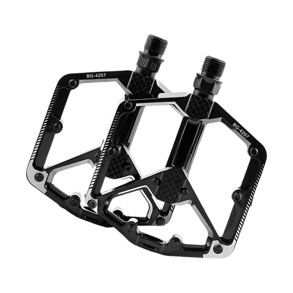 pedales de aluminio color negro. 9/16". en caja